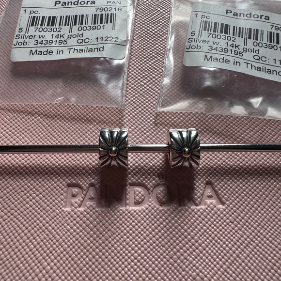 Pandora Jewelry - Genuine retired Pandora sunburst clips 14K gold and silver clips